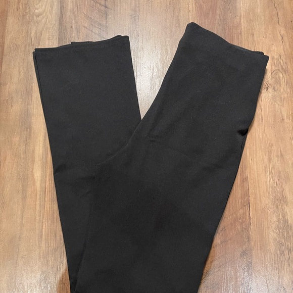 Long black flared pants with slits - Picture 2 of 6